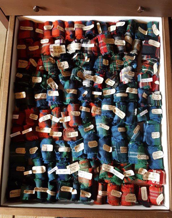 Weaver's Cottage selection of colourful and numerous Tartan samples, all labelled and stored in a drawer